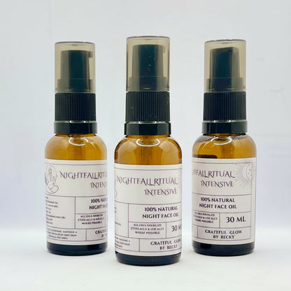 Three bottles of Nightfall Ritual Intensive face oil on a white background